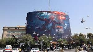 epa13188120 Birds perch near an anti-US billboard featuring US President Donald Trump in southern Tehran, Iran, 24 August 2026. US President Donald Trump said the US will launch 'economic D-Day' sanctions against Iran as the conflict between Iran and the US continues.  EPA/ABEDIN TAHERKENAREH RESTRICTIONS: NO Access Israel Media/Persian Language TV Stations Outside Iran/Strictly No Access BBC Persian/VOA Persian/Manoto TV/Iran International TV. (As mandated by Iran's Directorate General for Foreign Media) --