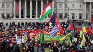 epa11312638 Workers from various nationalities and unions hold a May Day rally at Trafalgar Square in London, Britain, 01 May 2024. Labor Day, or May Day, is observed all over the world on the first day of May to celebrate the economic and social achievements of workers and advocate for their rights.  EPA/ANDY RAIN