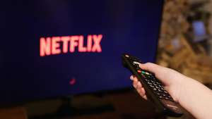 epa11884080 A television screen displays the Netflix streaming service logo, in London, Britain, 09 February 2025. The streaming platform has increased the cost of its most popular standard subscription in the UK by 2 British Pounds, or 18 percent, to 12.99 pounds (15.60 euros) per month.  EPA/NEIL HALL