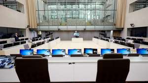 epa05038577 Interior view over the courtroom of the new home of the International Criminal Court (ICC) in The Hague, The Netherlands, 23 November 2015. The court, governed by the Rome Statute, is the first permanent, treaty based, international criminal court established to help end impunity for the perpetrators of the most serious crimes of concern to the international community.  EPA/MARTIJN BEEKMAN