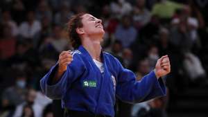 epa09527060 Barbara Timo of Portugal reacts after winning the women's -63kg semi-final match against Angelika Szymanska of Poland at the Paris Grand Slam judo tournament, in Paris, France, 16 October 2021.  EPA/CHRISTOPHE PETIT TESSON