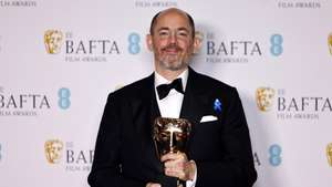epa10478787 Edward Berger, winner of the 'Best Director Award', poses in the press room of the 2023 EE BAFTA Film Awards ceremony at the Southbank Centre, in London, Britain, 19 February 2023. The event is hosted by the British Academy of Film and Television Arts (BAFTA).  EPA/TOLGA AKMEN *** Local Caption *** TEST CAPTION