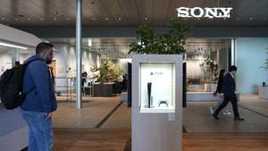 epa11754064 A man looks at a Sony PlayStation (PS5) game console on display at the company's headquarters in Tokyo, Japan, 03 December 2024. Sony released special PlayStation 5 models and peripherals in November 2024 to celebrate 30 years of its popular gaming console launched on 03 December 1994.  EPA/CHRISTOPHER JUE