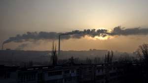 epa11889834 Smoke rises from power plant smokestacks at dusk in Chisinau, Moldova, 12 February 2025. Moldova periodically uses heavy fuel oil (HFO), which is cheaper than gas, to produce heat. Russian energy giant Gazprom suspend natural gas supplies to Moldova from 01 January 2025 after Ukraine refused to renew a transit agreement. Moldova could be seriously affected by the ending of the transit agreement as it generates much of its electricity at a power station fuelled by Russian gas.  EPA/DUMITRU DORU