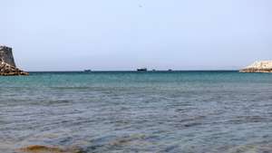epa12194525 Ships in the Strait of Hormuz as seen from Khasab, Musandam Governorate, Oman, 24 June 2025. The Iranian parliament approved a measure to close the Strait of Hormuz following US strikes on three of Iran's key nuclear sites on 22 June 2025. Israel and Iran have been exchanging fire since Israel launched strikes across Iran on 13 June 2025.  EPA/ALI HAIDER