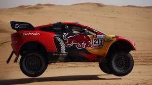 epa09668062 French driver Sebastien Loeb and Belgium copilot Fabian Lurquin of Bahrain Raid Xtreme team in action during the stage 4 of the Rally Dakar 2022 between Al Qaisumah and Riyadh, Saudi Arabia, 05 January 2022.  EPA/YOAN VALAT