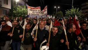 epa13285554 Protesters shout slogans during an anti-war rally on the occasion of the visit of US Secretary of State Marco Rubio in Athens, Greece, 06 October 2026.  EPA/ORESTIS PANAGIOTOU