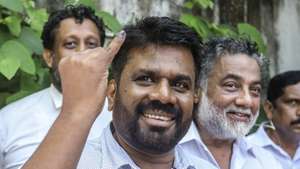 epa11617016 Anura Kumara Dissanayake, presidential candidate and leader of the opposition party  National People's Power (NPP), shows his ink-marked finger after casting his vote during the presidential election, in Colombo, Sri Lanka, 21 September 2024. Nearly 17.1 million registered voters in Sri Lanka are set to participate in the country's first election since mass protests and a significant political crisis, both sparked by the economic collapse of 2022. A total of 39 candidates from recognized political parties and independent groups have filed their nominations, with current president Ranil Wickremesinghe seeking a second term.  EPA/CHAMILA KARUNARATHNE