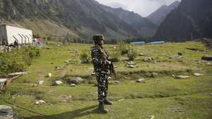 epa09492724 An Indian paramilitary soldier stands guard outside the tunnel during the visit of Minister for Road Transport and Highways, Nitin Gadkari (not pictured), at Zojila tunnel on Srinagar-Ladakh highway in Zojila, some 100 kilometers from Srinagar, the summer capital of Indian Kashmir, 28 September 2021. Once completed the Zojila tunnel will be India’s longest road tunnel and Asia’s longest bi-directional tunnel and will make Srinagar-Ladakh highway an all-weather road.  EPA/FAROOQ KHAN
