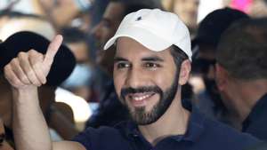 epa11197712 The president of El Salvador Nayib Bukele gestures after voting at the polling station located on Avenida Olimpica, in San Salvador, El Salvador, 03 March 2024. Bukele cast his vote in the municipal and Central American Parliament (Parlacen) elections, in which his party Nuevas Ideas (NI) is the main favorite.  EPA/Rodrigo Sura