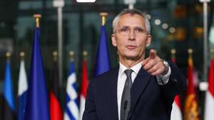 epa11634818 Former NATO Secretary General Jens Stoltenberg gestures during a ceremony to mark the transition to the new NATO Secretary General, at the Alliance headquarters in Brussels, Belgium, 01 October 2024. Former Dutch Prime Minister Mark Rutte succeeds Jens Stoltenberg as Secretary General of the North Atlantic Treaty Organization (NATO) on 01 October 2024 after the latter's ten years at the helm of the Alliance.  EPA/OLIVIER HOSLET