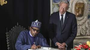 Portugal's President Marcelo Rebelo de Sousa (R) accompanied by  Nigeria's President Muhammadu Buhari (L) during the welcome ceremony at Belém Palace in Lisbon, Portugal, 30 June 2022. MIGUEL A. LOPES/LUSA