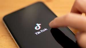 epa08678602 (FILE) - A close-up shows the video-sharing application 'TikTok' on a smart phone in Berlin, Germany, 07 July 2020 (reissued 18 September 2020). The US Commerce Department on 18 September 2020 announced that downloads of ByteDance's video sharing app TikTok and multi-purpose messaging and payment platform WeChat will be blocked in the US starting 20 September 2020.  EPA/HAYOUNG JEON