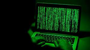 epa07261857 ILLUSTRATION - A person sits in front of a computer screen in Moers, Germany, 04 January 2019. Reports on 04 January 2019 state personal data of hundreds of German politicians, celebrities and journalists have been hacked and posted online. The compromised data reportedly includes credit card details, private chat protocols and contact information. The data was allegedly shared via a Twitter account under the name G0d (@_0rbit) prior to Christmas 2018, which has been suspended in the meantime.  EPA/SASCHA STEINBACH