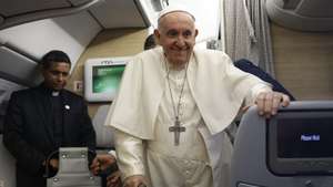 epa10098166 Pope Francis holds a news conference aboard the papal plane on his flight back after visiting Canada, 30 July 2022.  EPA/GUGLIELMO MANGIAPANE / POOL