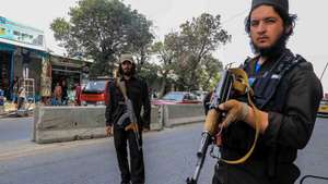 epa10127191 Armed members of Taliban stand gaurd near a Mosque that was damaged in a suicide bomb attack in Kabul, Afghanistan, 18 August 2022. At least 21 people were killed and another 33 injured in a recent suicide attack on a mosque in the Afghan capital, the police said 18 August. No armed group has claimed responsibility for the explosion although the Islamic State (IS) terror group, which is the biggest threat to the Taliban regime, usually claims responsibility for such attacks.  EPA/STRINGER