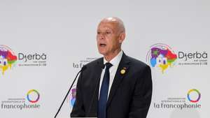 epa10314461 A handout photo made available by Tunisian presidency press service shows Tunisia's President Kais Saied speaks during the 18th Francophonie Summit in Djerba, Tunisia, 19 November 2022.  EPA/TUNISIAN PRESIDENCY  HANDOUT  HANDOUT EDITORIAL USE ONLY/NO SALES