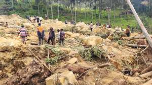 epa11374596 A handout photo made available by the International Organization for Migration (IOM), shows local inhabitants searching for missing relatives at the landslide site in Tulpar community, Yambali Ward, Enga province, Papua New Guinea, 28 May 2024. According to a senior official with the International Organization for Migration (IOM), on 26 May, more than 670 people were feared dead, after a landslide hit the Highlands region of Papua New Guinea early on 24 May. The country&#039;s National Disaster Center raised the potential death toll to 2,000 people in a letter to the UN released on 27 May.  EPA/International Organization for Migration (IOM) - PNG/ HANDOUT   HANDOUT EDITORIAL USE ONLY/NO SALES HANDOUT EDITORIAL USE ONLY/NO SALES