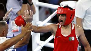 epa11541275 Imane Khelif of Algeria celebrates winning against Yang Liu of China their Women's 66kg Final bout of the Boxing competitions in the Paris 2024 Olympic Games, at Roland Garros in Paris, France, 09 August 2024.  EPA/MAST IRHAM