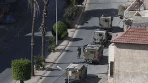 epa11587395 Israeli military patrol the streets amid the ninth day of an ongoing military operation in the West Bank city of Jenin, 05 September 2024. According to the Palestinian Health Ministry, at least 39 Palestinians have been killed since Israeli military operations started on 28 August 2024 in the West Bank cities of Tulkarem, Jenin, and Tubas. The Israeli army said that it&#039;s conducting a large-scale &#039;counterterrorism operation&#039; in several areas.  EPA/ALAA BADARNEH