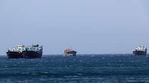 epa12194528 Ships in the Strait of Hormuz as seen from Khasab, Musandam Governorate, Oman, 24 June 2025. The Iranian parliament approved a measure to close the Strait of Hormuz following US strikes on three of Iran's key nuclear sites on 22 June 2025. Israel and Iran have been exchanging fire since Israel launched strikes across Iran on 13 June 2025.  EPA/ALI HAIDER