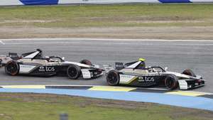 epa12839142 Jaguar TCS Racing drivers Mitch Evans of New Zealand (L) and Antonio Felix da Costa of Portugal compete in the Madrid E-Prix race at the Circuito de Jarama, in San Sebastian de los Reyes, Madrid, Spain, 21 March 2026.  EPA/SERGIO PEREZ
