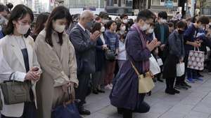 epa10514623 People offer a minute silent prayer for the victims of the 'Great East Japan Earthquake' at the time the earthquake took place to mark its 12th anniversary, at Ginza in central Tokyo, Japan, 11 March 2023. The magnitude 9.0 earthquake triggered a tsunami that devastated the Tokyo Electric Power Company (TEPCO) Fukushima Daiichi Nuclear Power Plant, causing a nuclear accident, and the coastal side of northern Japan, killing about 16,000 people and leaving more than 2500 still missing. According to the National Police Agency, another 3,800 people died as a result of the earthquake.  EPA/KIMIMASA MAYAMA