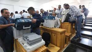 epa11609208 Polling officials check their Electronic Voting Machines (EVM) before leaving for their respective polling stations on the eve of the first phase of the Jammu and Kashmir Legislative Assembly election in Pulwama south of Srinagar, the summer capital of Indian Kashmir, 17 September 2024. The Election Commission of India (ECI) announced on 16 August 2024 that the Jammu and Kashmir Legislative Assembly elections will be held in three phases between 18 September and 1 October 2024. Jammu and Kashmir is holding its first election since the territory&#039;s special status was revoked in 2019.  EPA/FAROOQ KHAN