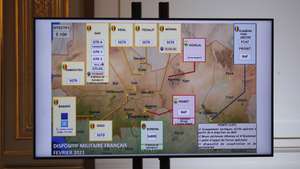 epa09015894 A map of French army locations in Sahel is pictured as French President Emmanuel Macron (not pictured) delivers his speech after a meeting via video-conference with leaders of the G5 Sahel, in Paris, France, 16 February 2021. French President Macron urged West African leaders to step up efforts in the fight against Islamic extremists in the Sahel region both on the military and political fronts, with support from the international community. Macron joined by video from Paris a summit organized in N’Djamena, Chad with the leaders of Mali, Burkina Faso, Chad, Niger and Mauritania.  EPA/FRANCOIS MORI / POOL  MAXPPP OUT