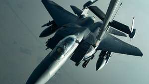 epa07751678 A handout photo made available by the US Air Force shows an F-15E Strike Eagle assigned to the 336th Expeditionary Fighter Squadron refueling from a KC-10 Extender, at an undisclosed location during a surface combat air patrol mission in the Arabian Gulf, 27 June 2019 (issued 01 August 2019). The F-15Es are flying air operations in support of maritime surface warfare over the Arabian Gulf and provide aerial escorts of naval vessels as they traverse the Strait of Hormuz.  EPA/US AIR FORCE/STAFF SGT. ERIN PIAZZA HANDOUT  HANDOUT EDITORIAL USE ONLY/NO SALES