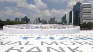 epa13288812 Thai workers put the finishing touches on the logo of the 2026 Annual Meetings of the International Monetary Fund (IMF) and the World Bank Group at the Queen Sirikit National Convention Center in Bangkok, Thailand, 08 October 2026. Thailand is preparing to host the meetings from 12 to 18 October, with thousands of central bankers, finance ministers and global development leaders expected to attend.  EPA/RUNGROJ YONGRIT