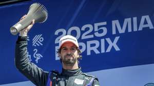 epa12028100 Antonio Felix da Costa of Team TAG Heuer Porsche Formula E Team holds the trophy after winning the third place of the Miami E-Prix at the Homestead Miami Speedway in Homestead, Florida, USA, 12 April 2025.  EPA/CRISTOBAL HERRERA-ULASHKEVICH