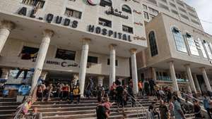 epaselect epa10950988 Palestinian families who fled their homes gather at the Al-Quds hospital following Israeli airstrikes on Tel al-Hawa neighborhood in Gaza City, 31 October 2023. More than 8,000 Palestinians and at least 1,400 Israelis have been killed, according to the Israel Defense Forces (IDF) and the Palestinian health authority, since Hamas militants launched an attack against Israel from the Gaza Strip on 07 October, and the Israeli operations in Gaza and the West Bank which followed it.  EPA/MOHAMMED SABER