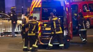 epa05023844 Wounded people are evacuated from the Stade de France in Paris, France, 13 November 2015, after explosions were reported. At least 26 people have died in attacks in Paris on 13 November after reports of a shootout and explosions near the Stade de France stadium.  EPA/IAN LANGSDON