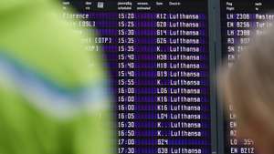 epa12730050 A view of screens for departures in Terminal 2 during a strike at the international airport in Munich, Germany, 12 February 2026. Pilots and cabin crew are striking at Lufthansa and Lufthansa Cargo. In addition to the hubs in Frankfurt and Munich, airports in Hamburg, Bremen, Stuttgart, Cologne, Duesseldorf, Berlin, and Hanover are also directly affected.  EPA/RONALD WITTEK