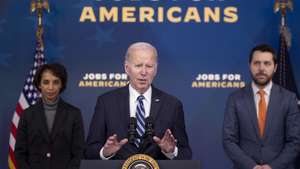 epa10445695 US President Joe Biden (C) delivers remarks on employment figures and the economy in front of Cecilia Rouse (L), Chair of the Council of Economic Advisers and Brian Deese (R), Assistant to the President &amp; Director of the National Economic Council in the Eisenhower Executive Office Building on the White House complex in Washington, DC, USA, 03 February 2023.  EPA/MICHAEL REYNOLDS