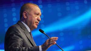 epa09303398 A handout photo made available by the Turkish President Press office shows Turkish President Recep Tayyip Erdogan speaking during the Istanbul Canal Bridge groundbreaking ceremony in Istanbul, Turkey, 26 June 2021. The Canal Istanbul, a 45 kilometers long artificial canal with 10 bridges, will connect the Black Sea with the Sea of Marmara and will have a boast of a capacity of 160 vessels a day.  EPA/TURKISH PRESIDENT PRESS OFFICE HANDOUT  HANDOUT EDITORIAL USE ONLY/NO SALES