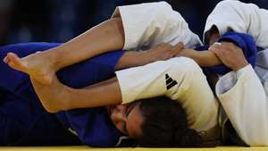 epaselect epa11520984 Spain&#039;s Cristina Cabana Perez (R) in action against Shaheen Nigara (L) of the Refugee Team, during the Mixed Team Elimination Round of Judo at the Paris 2024 Olympic Games, in Paris, France, 03 August 2024.  EPA/MIGUEL GUTIERREZ