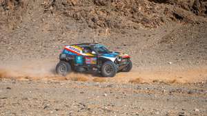 epa11822330 Joao Ferreira of Portugal and Filipe Palmeiro of Portugal compete with their Mini JCW Rally 3.0d for X-raid Mini JCW Team during the eighth stage of the 2025 Dakar Rally from Al Duwadimi to Riyadh, Saudi Arabia, 13 January 2025.  EPA/Marie Hessel