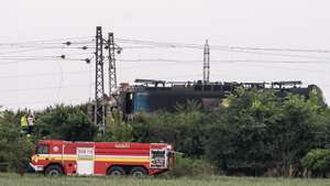 epa11442040 The scene in the aftermath of a train crash in the city of Nove Zamky, Slovakia, 27 June 2024. The accident happened at a railway crossing near the town of Nove Zamky in Southern Slovakia. Five ambulances and two helicopters have been despatched to the accident site. An express train carrying more than 100 passengers from Budapest to Prague crashed into a bus shortly after 5 p.m. local time, killing at least five people and injuring several others.  EPA/JAKUB GAVLAK