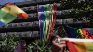 epa10710754 LGBT (lesbian, gay, bisexual, transgender) community members and supporters hold rainbow-colored flags and shout slogans during the Pride March in Istanbul, Turkey, 25 June 2023. The Turkish Government has banned the Istanbul Pride March as they already did in previous years.  EPA/ERDEM SAHIN
