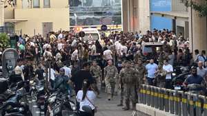 epa11609842 Lebanese soldiers and Hezbollah members gather outside a hospital where injured people were being transported, following an incident involving Hezbollah membersâ€™ wireless devices in Dahieh, Beirut, south Lebanon, 17 September 2024. According to Lebanonâ€™s state news agency, several â€˜wireless communication devices (pagers) were detonated using advanced technology.â€™ Several people with various injuries have been arriving at Lebanese hospitals, according to the Lebanese Public Health Emergency Operations Center of the Ministry of Public Health.  EPA/WAEL HAMZEH