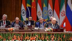 epa13233815 Russian President Vladimir Putin (R) attends a session of the 18th BRICS Summit, with Kremlin spokesman Dmitry Peskov (L), Foreign ⁠Minister Sergey Lavrov (2-L), Deputy Chief of Staff of the Presidential Executive Office Maxim Oreshkin (C) and Presidential Aide Yury Ushakov (2-R) behind, in New Delhi, India, 12 September 2026. India hosts the 18th BRICS Leaders' Summit from 12 to 13 September 2026 under the theme 'Building for Resilience, Innovation, Cooperation and Sustainability.'  EPA/ALEXANDER KAZAKOV/SPUTNIK/KREMLIN / POOL MANDATORY CREDIT