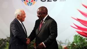 epa12541344 South African President Cyril Ramaphosa (R) welcomes Antonio Costa, President of the European Council, at the ​Johannesburg Expo Centre for the G20 Leaders' Summit, Johannesburg, South Africa, 22 November 2025, for the Group of Twenty (G20) Leaders' Summit. World leaders are gathering in South Africa, the host of this year's G20 Leaders' Summit on 22 and 23 November 2025, to discuss the global economy, development and financing.  EPA/HALDEN KROG / POOL