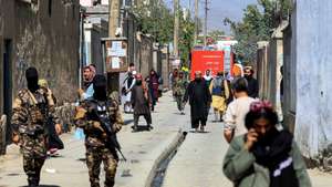 epa10215539 Taliban stand guard at the scene of a bomb blast in Kabul, Afghanistan, 30 September 2022. At least 19 people were killed and another 27 injured after a powerful explosion occurred at a school in a Shia Hazara neighborhood in western Kabul on 30 September, police said. No terrorist outfit has claimed responsibility for the attack so far although the Islamic State (IS) terror group has traditionally targeted this minority.  EPA/STRINGER