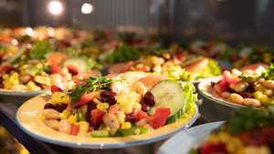 epa07522636 Dishes of salads are prepared in the vegan refectory on the campus of the Technical University in Berlin, Germany, 23 April 2019. The first vegan canteen officially opens in Berlin.  EPA/HAYOUNG JEON  ATTENTION: This Image is part of a PHOTO SET