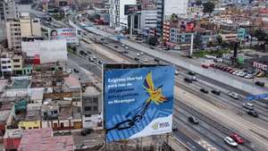 epa10225419 View of a billboard calling for the release of '205 political prisoners in Nicaragua' in the streets of Lima, Peru, 05 October 2022. Peru hosts the fifty-second regular session of the 52nd OAS General Assembly from 05 to 07 October in Lima where delegations from more than 30 countries will arrive.  EPA/Aldair Mejia