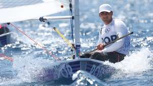 epa11516296 Eduardo Marques of Portugal during the first race  in the Men's Dinghy ILCA 7 class of the Sailing competitions in the Paris 2024 Olympic Games, at the Marseille Marina in Marseille, France, 01 August 2024. The race was stopped for a second time because of a lack of wind.  EPA/OLIVIER HOSLET