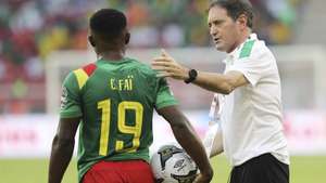 epa09676267 Cameroon coach Antonio Conceicao and player Ngoran Suiru Fai of Cameroon during the 2021 Africa Cup of Nations soccer match between Cameroon and Burkina Faso at Olembe Stadium in Yaounde, Cameroon, 09 January 2022.  EPA/GAVIN BARKER
