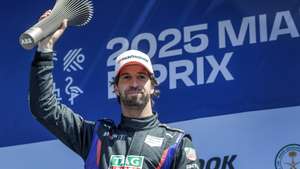 epa12028100 Antonio Felix da Costa of Team TAG Heuer Porsche Formula E Team holds the trophy after winning the third place of the Miami E-Prix at the Homestead Miami Speedway in Homestead, Florida, USA, 12 April 2025.  EPA/CRISTOBAL HERRERA-ULASHKEVICH